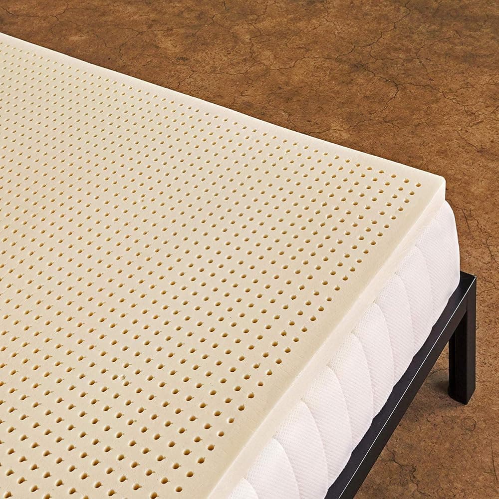 Pure Green 2-inch natural latex mattress topper on a mattress