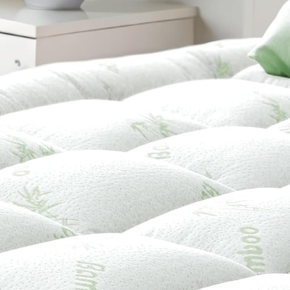 Niagara quilted pillow-top mattress pad on a bed